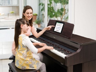 Alasan Mengapa Anak Anda Harus Belajar Piano.2